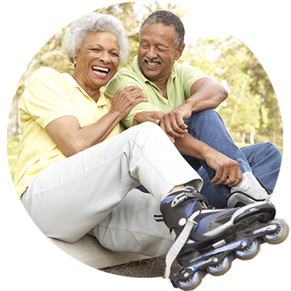 Older couple taking a break from roller-skating.